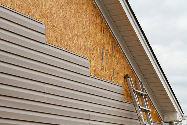 Professional Siding Replacement technician working in Roseville, MN